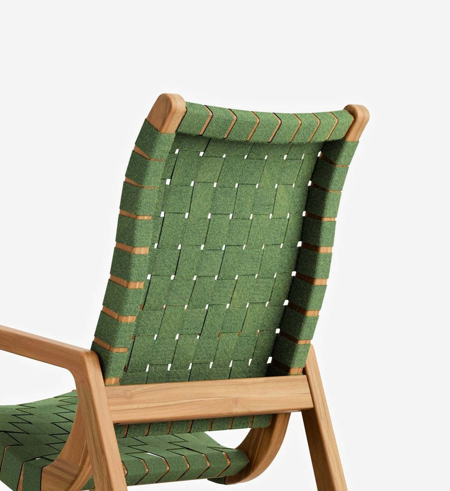 A close-up of a mid-century modern wooden chair with a green woven sling seat and backrest, featuring light natural wood arms and frame, set against a plain white background.