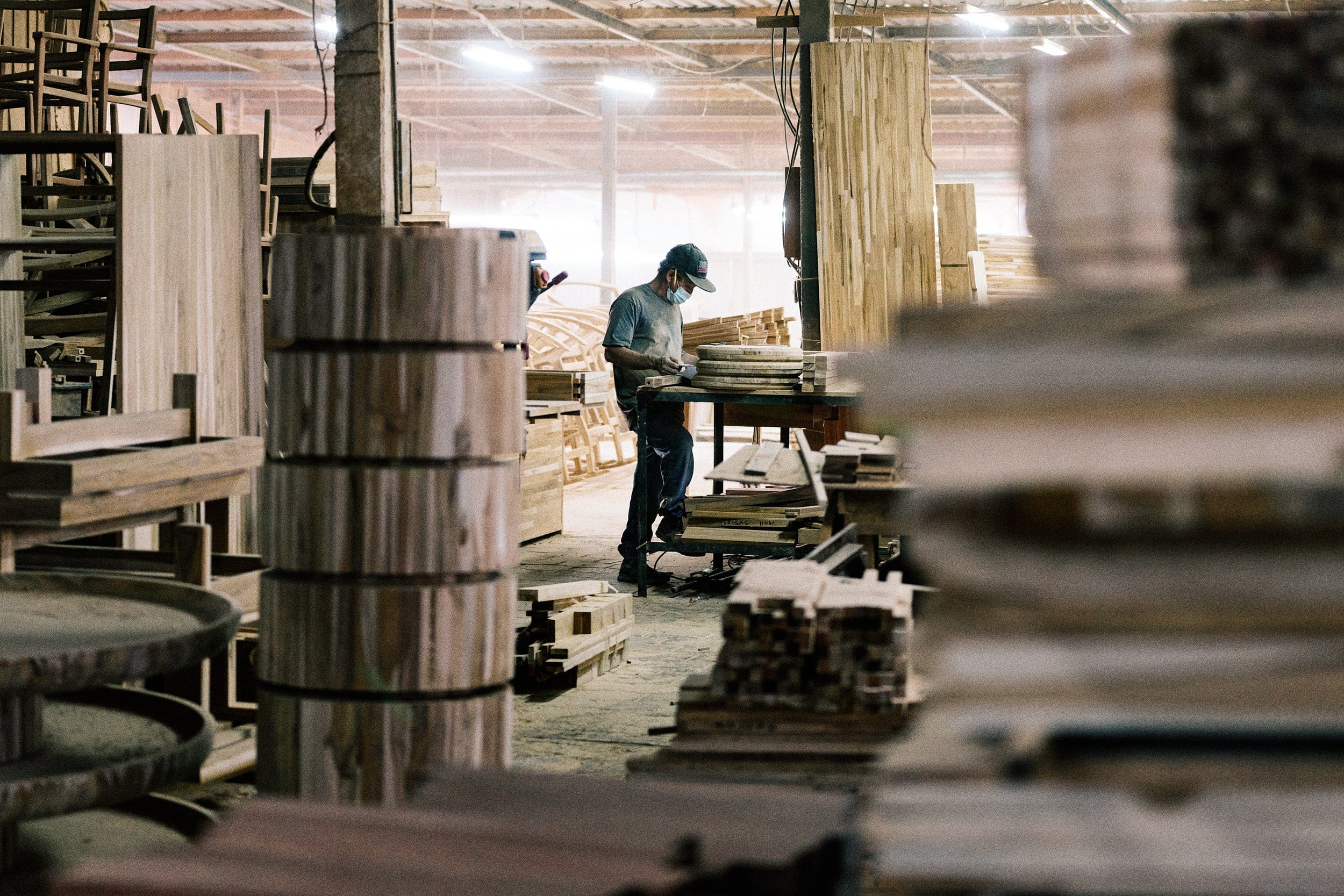 Artisan handcrafting furniture at MasayaCo