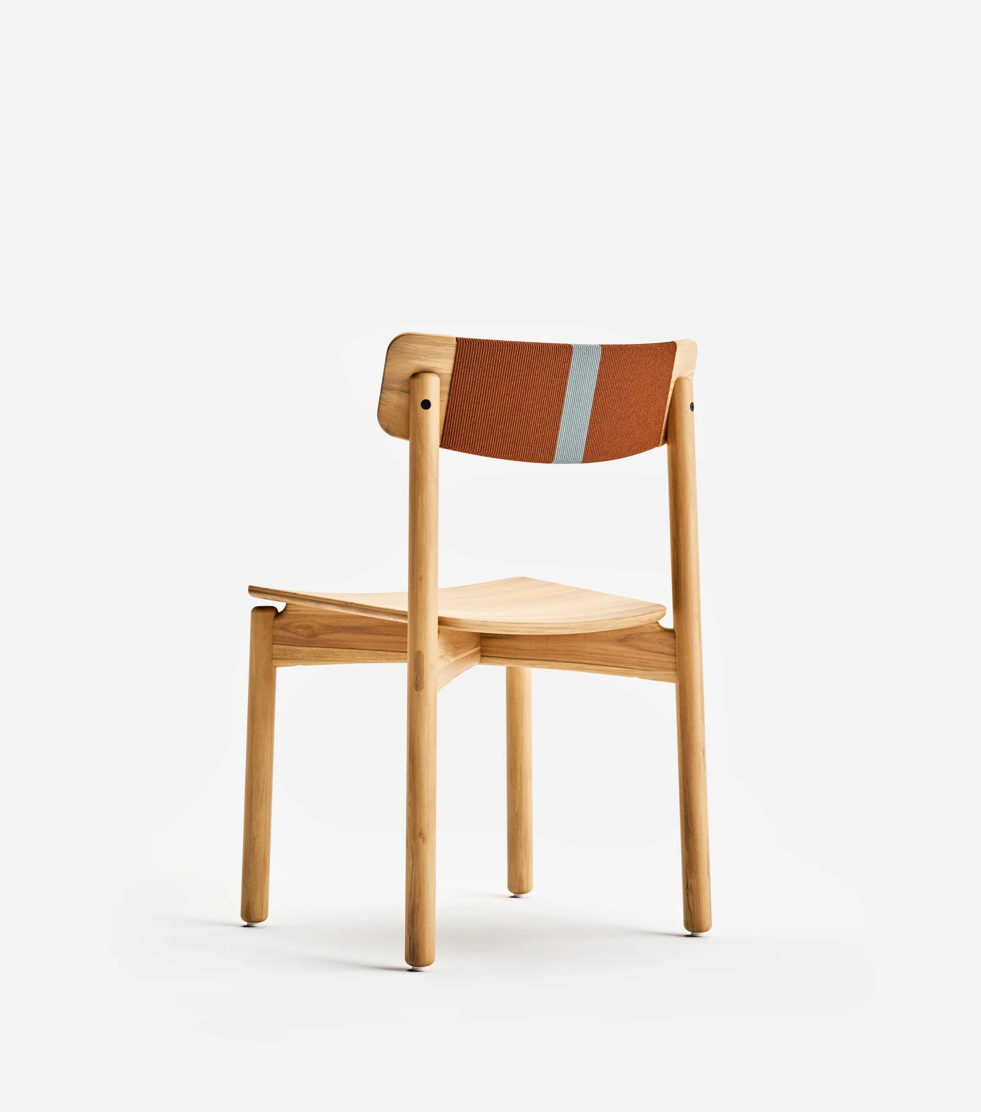 Made to be versatile. The Masaya Stacking Chair is our new teak dining chair.